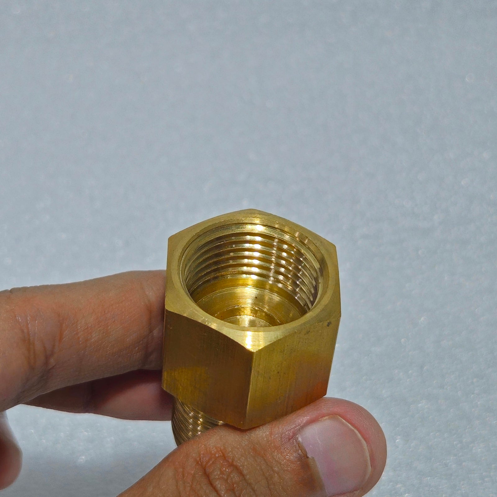 PCP universal brass adapter size in hand